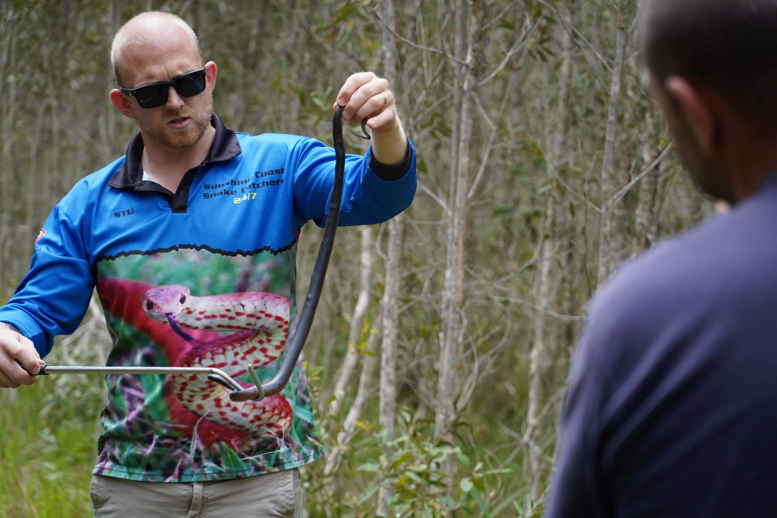 Stuart Showing man a snake